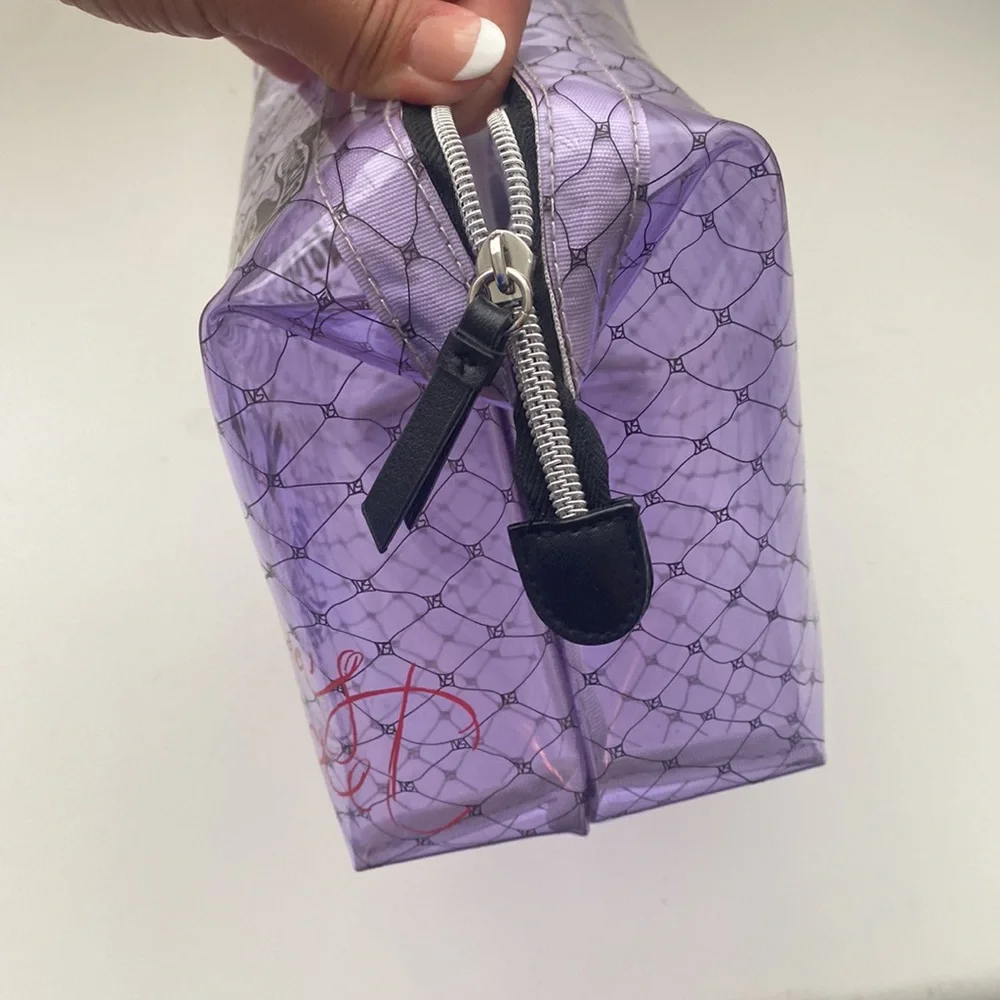 Purple plastic victorious secret makeup bag